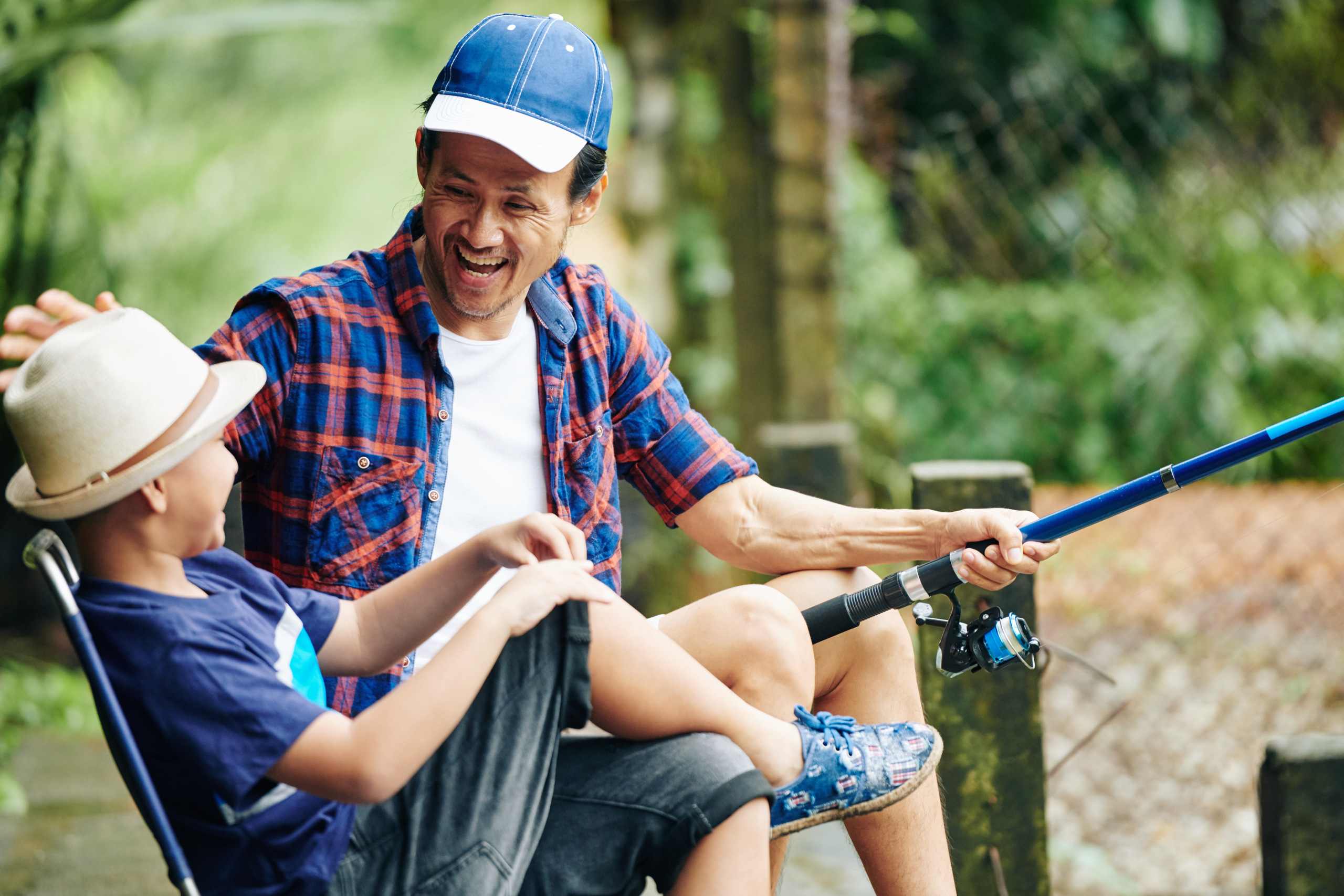 Man and child enjoying fishing